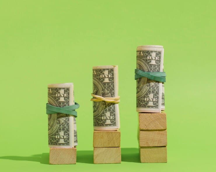 Arrangement with Banknotes and Wooden Cubes
